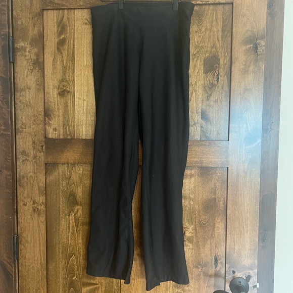 Woman's Lucy Activewear, black, flare pants. Size small. Elastic waist /pocket. - Picture 2 of 7